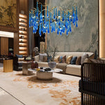 lustre contemporain élégant gouttes cristal bleu doré opalescent led salon chambre