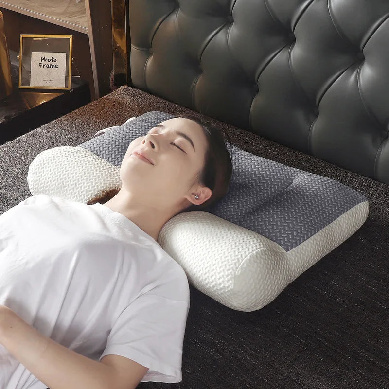 oreiller cervical ergonomique gris blanc texture tissée moderne contour arrondi fixations