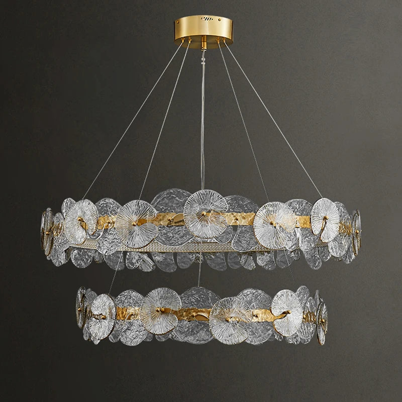 suspension lumineuse moderne dorée transparente disques circulaires texture rugueuse contemporaine élégante chaînes suspendues LED