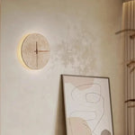 lampe murale moderne horloge pierre texturée beige clair cuisine chambre coucher salle manger