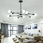suspension lumineuse moderne or noir sphères translucides scandinave structure métallique pince suspension