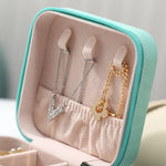 boîte bijoux simili cuir fermeture glissière moderne colliers boucles d'oreilles bagues bracelets vert rose