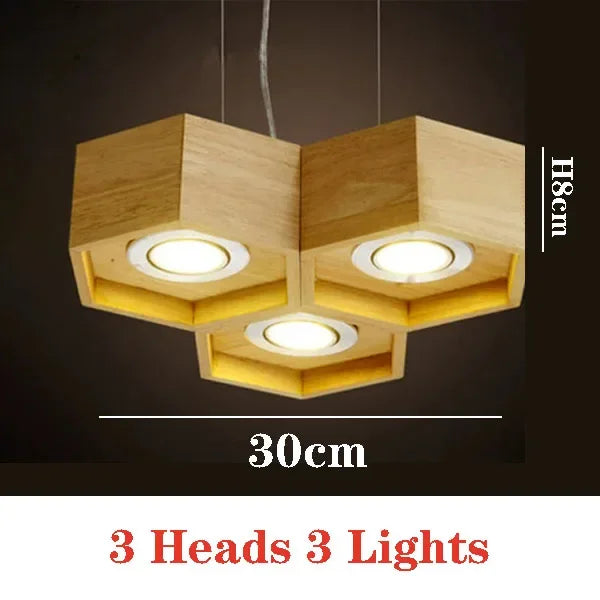 lumière suspendue bois clair nid d'abeille hexagonal modernes led câbles argentés structure géométrique