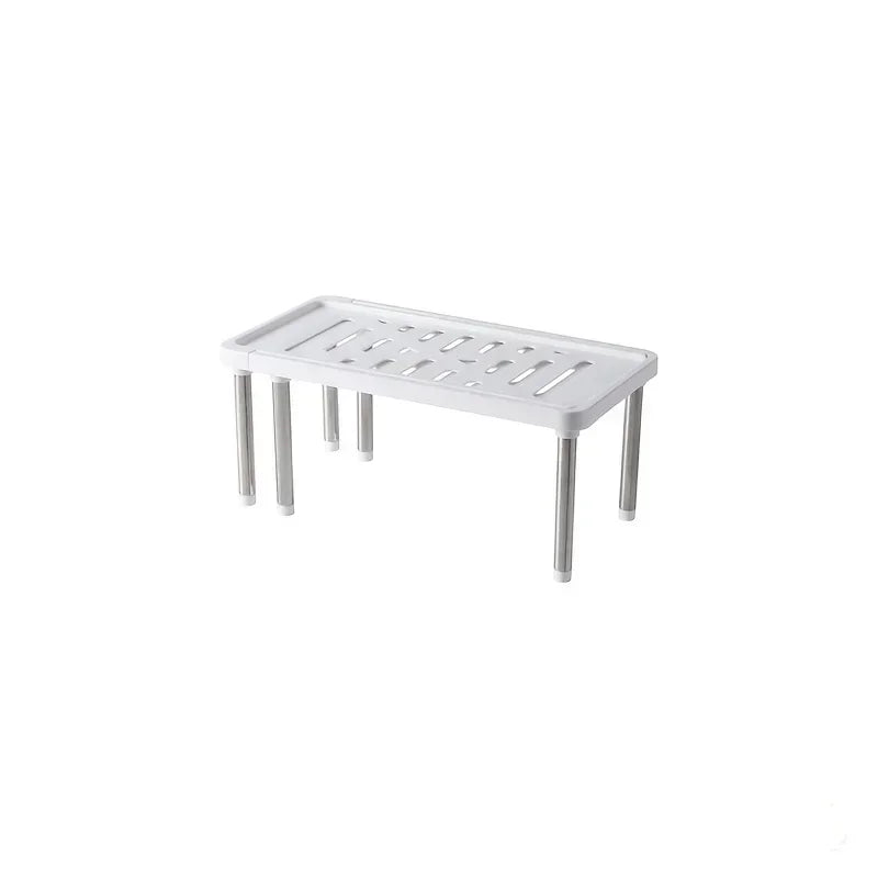 étagère cuisine rétractable blanc gris moderne perforations pieds métalliques bouteilles épices appareils électroménagers