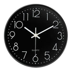 horloge murale cadre doré aiguilles noires numéros blancs moderne chambre coucher