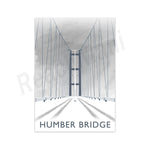 Le pont Humber, un impressionnant ouvrage d'art suspendu avec ses câbles d'acier traversant un ciel nuageux.
