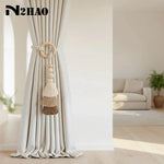 rideau boho chic anneaux bois pompons coton beige clair uni