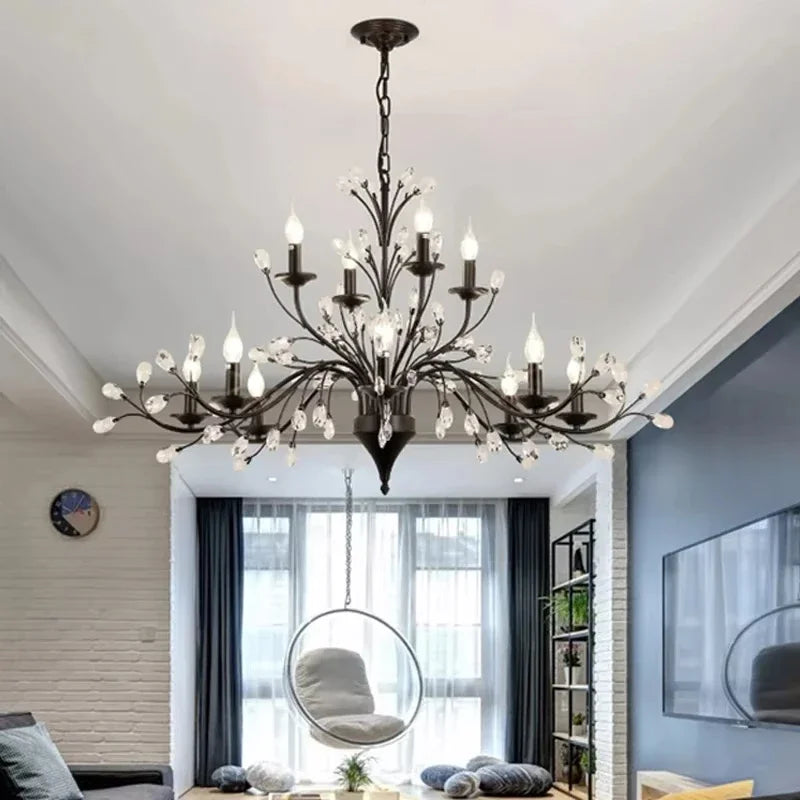 chandelier noir moderne cristaux transparents ampoules blanc chaud suspension élégante branches floralesstylisées