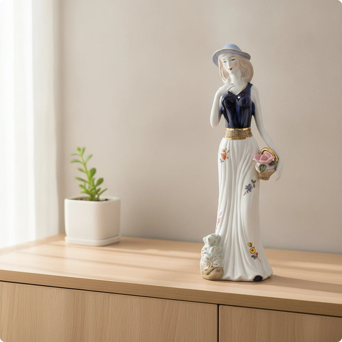statuette féminine céramique émaillée robe élégante motifs floraux classique chapeau blanc bleu doré