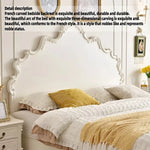 lit blanc classique ornements sculptés motifs floraux tête lit chevet coussins draps oreillers tapis