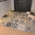 tapis d'entrée extérieur pvc noir blanc motif géométrique moderne antidérapant couloir porte