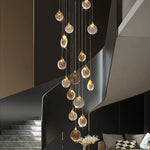 suspension lumineuse moderne cristal transparent dorées salon restaurant chambre principal