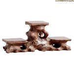 support plante bois sculpté artisanal marron foncé pot fleurs décoration végétale rustic stand