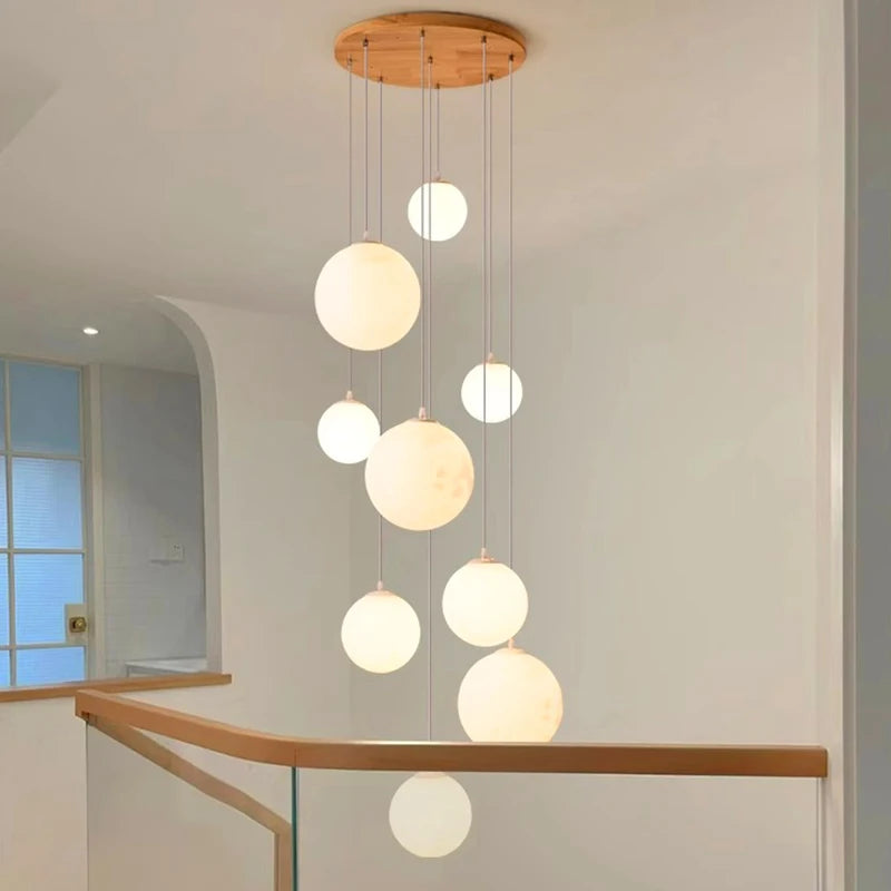 suspension lumineuse moderne plusieurs têtes éclairage led blanc bois clair diffuseur lumière minimaliste
