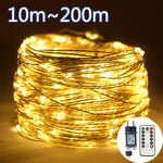 Guirlande lumineuse LED 50M fil argent illumine un jardin la nuit