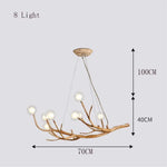 suspension lumineuse moderne branches naturelles sphères translucides marron clair blanc