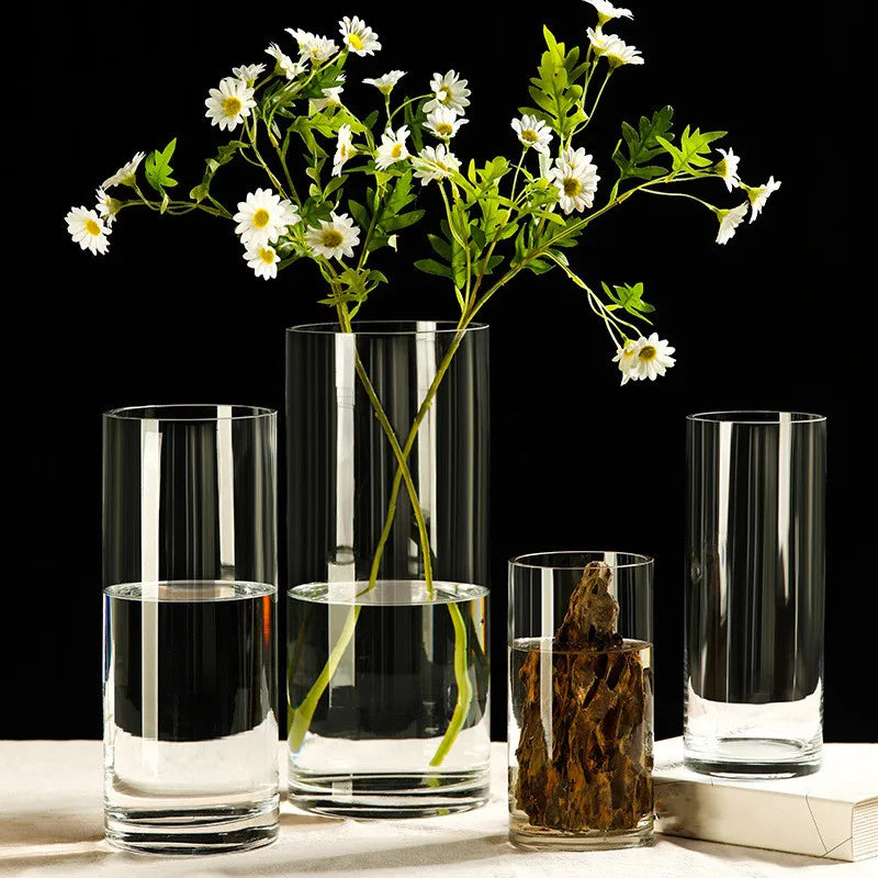 vase verre transparent moderne fleurs plantes artificielles coquillages décoration intérieure table salon