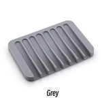 support savon silicone rayures horizontales gris rose blanc moderne comptoir salle bains