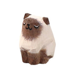 statue animale bois figurine bleu rose motif floral minimaliste yeux stylisés petite deco