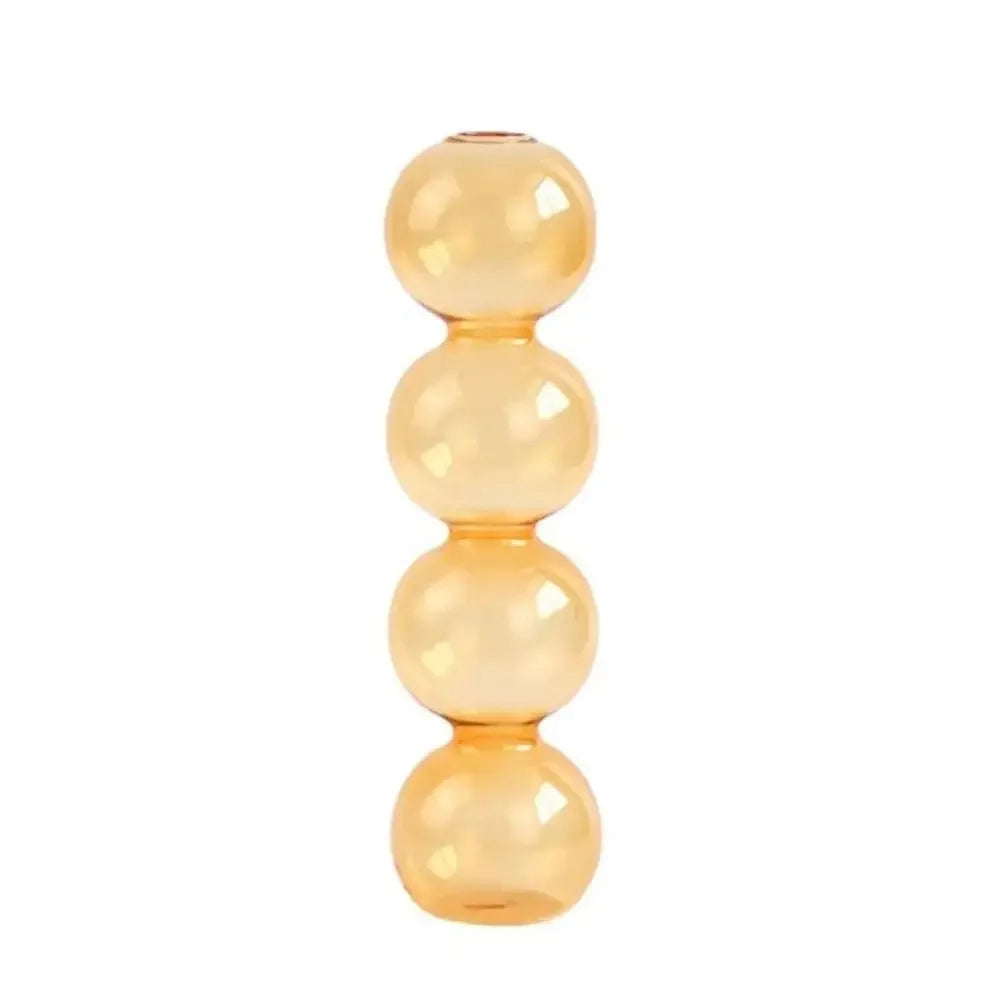 vase moderne transparent sphères empilées jaune clair rose bleu vert brun