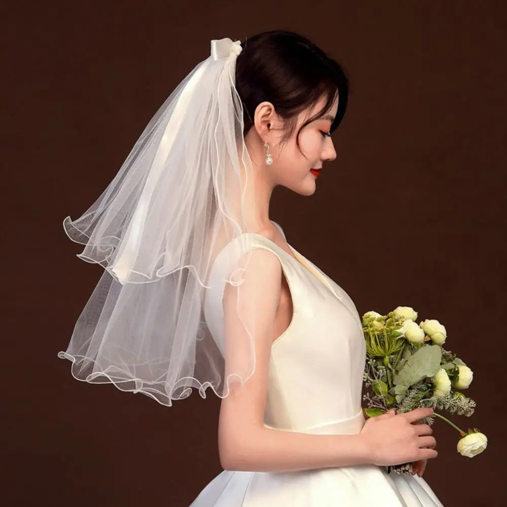 voile mariée blanc translucide détails floraux classique clips inclusion élégant