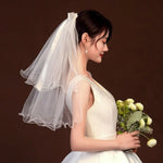 voile mariée blanc translucide détails floraux classique clips inclusion élégant