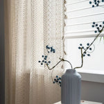 rideau boho chic beige clair dentelle fine motifs géométriques pompons blancs 100 coton résistant
