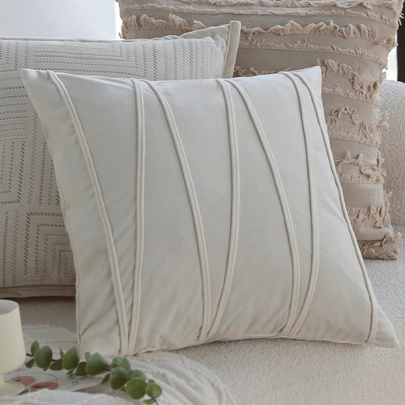 coussin motif feuilles stylisées beige clair moderne opacité 45x45cm franges fixation