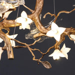 Suspension lumineuse moderne oiseaux transparents branches dorées fleurs blanches led verre chrome poli chambre