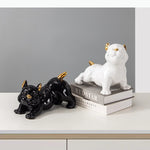 figurine chien bouledogue français noir blanc détails dorés lisse brillante moderne décorative