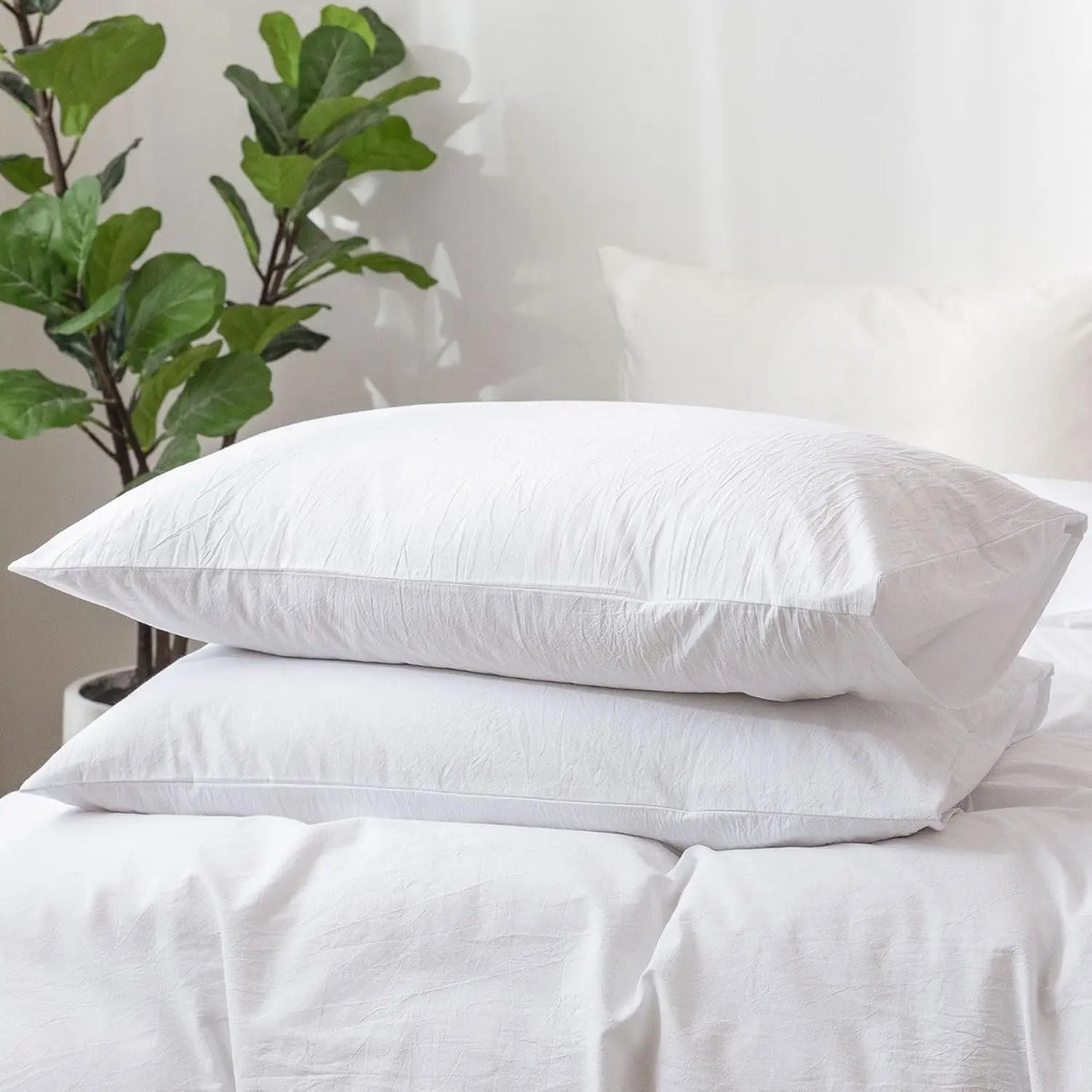 taies d'oreiller texturées blanc plissées coton polyester respectueuses environnement durables minimalistes modernes
