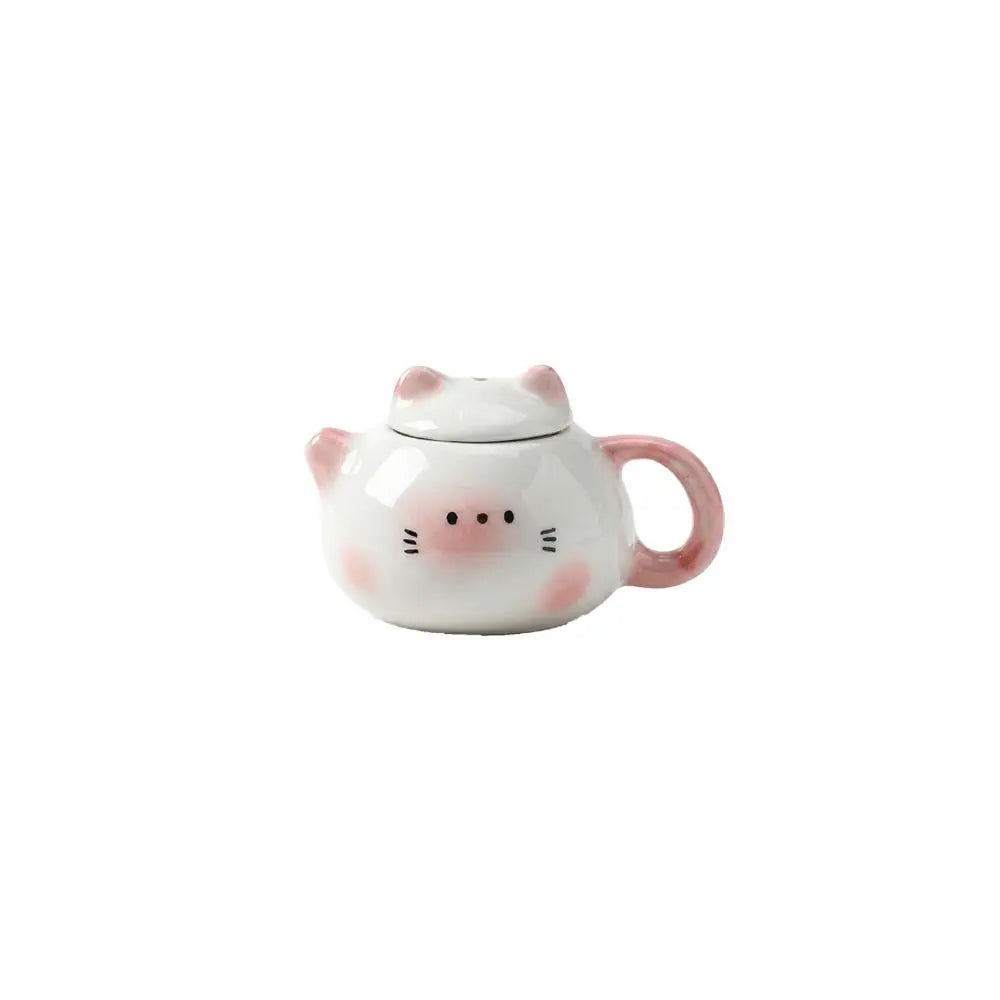 théière forme chat blanc orange rose visage mignon oreilles pointues taches oranges decorative cartoonish