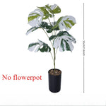 plantes artificielles feuilles monstera vertes nervures taches blanches moderne decoration intérieure