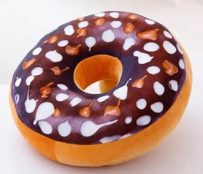 coussin donut forme ronde peluche animée couleurs variées glaçage sucre coloré décoration intérieure sofa