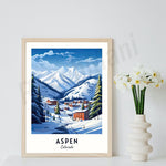 Une image encadrée d'une scène hivernale pittoresque d'Aspen dans le Colorado, avec des montagnes enneigées, des maisons et une piste de ski sous un ciel bleu avec des nuages blancs.