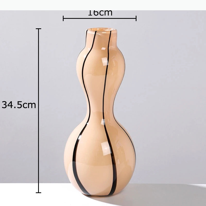 vases modernes translucides opaques motifs tourbillonnaires branches fleurs artificielles marron orange beige