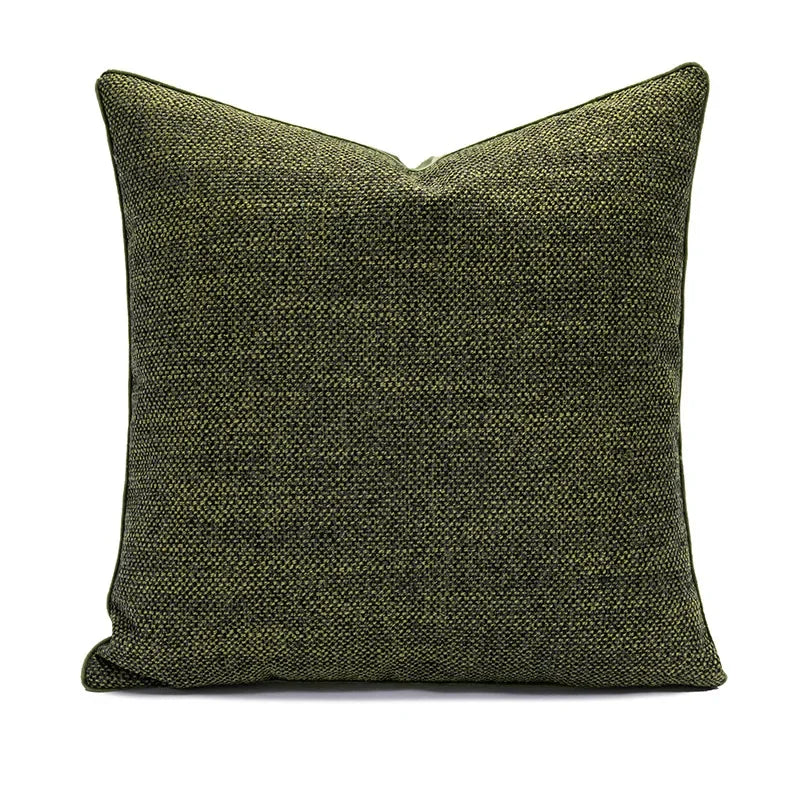 coussin vert olive rayures moderne décoration intérieure blanc motif géométrique noir plissé