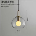 suspension lumineuse moderne gris fumé doré verre mat métal poli ampoule filament visible chambre