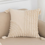 coussin brodé géométrique moderne toile coton couleur beige pompons décoratif