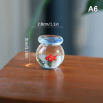décoration maison boule verre artisanale poisson ruban transparent bleu rouge orange