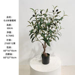 plantes artificielles vertes tronc gris brun moderne decoration intérieure anniversaire exposition sans pot faux