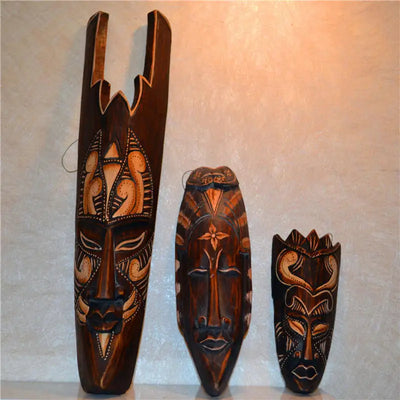 Masque mural africain en bois gris foncé 50cm