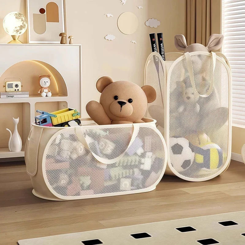panier jouets maille moderne beige clair pliable rangement horizontal vertical organisation enfant poupée voiture