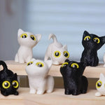 figurines chats miniature résine noir blanc yeux jaunes brillants cartoon mignon décoration erotiquecollector