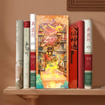 Serre-livres en bois rose avec lumière