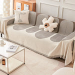 couverture canapé moderne rayures horizontales franges beige crème gris clair salon intérieur
