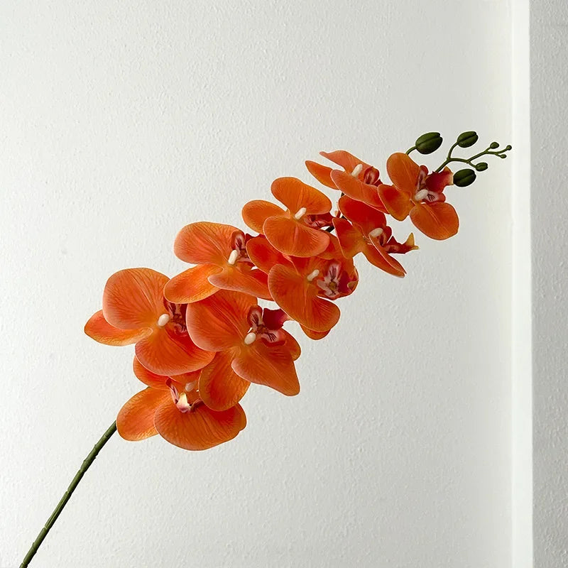 décoration intérieure vase orchidées artificielles fleurs douces feuilles vertes moderne élégant rose blanc violet