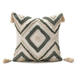 coussin décoratif boho chic blanc bleu marron beige doré motifs géométriques pompons coton