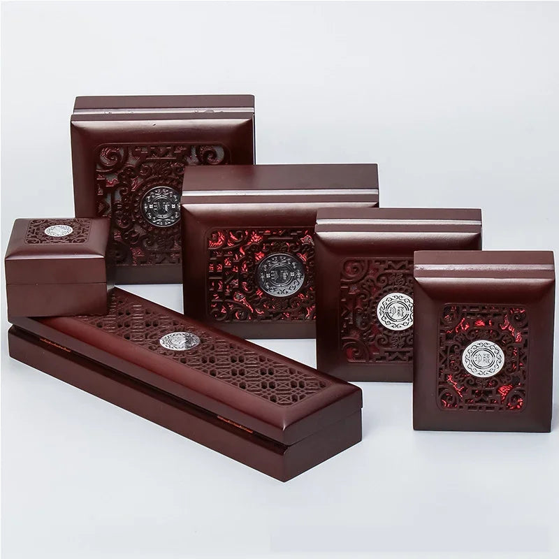 boîtes bois marron foncé boîte bijoux décoration intérieure boutons métalliques ajourés respectueux environnement classique