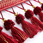 ruban pompons tissus rouge marron gris violet rose doré traditionnel décoratif
